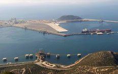 Aerial view of the harbour in the background and the construction of the new dock